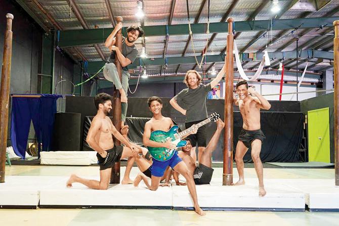 they pose during rehearsals with Donn Bhatt (on the pole) and Ben Knapton (back)