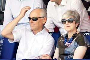 Former British PM May watches cricket on first day out of office