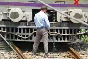 Central Railway motorman jumps off halted train to pee on tracks