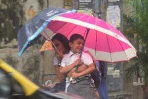 Students, office-goers brave continuous downpour as dry spell ends