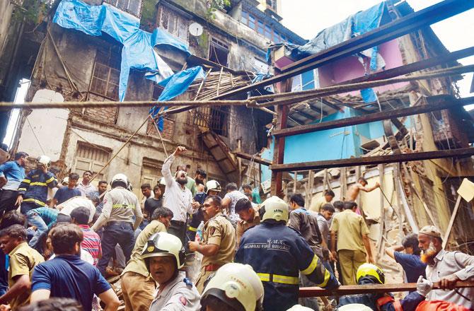The NDRF teams had a tough time rescuing survivors from the debris of the building that collapsed on Tuesday. File pics