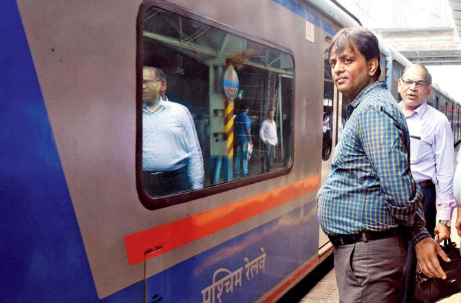 Till five years ago, Shailesh Goyal would take two-and-a-half hours to travel from Bhayander West to Marine Lines. Today, with the commute having extended to four hours one way, he has switched to the AC local, which he says saved him both time and stress. Pic/Nimesh Dave