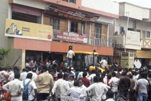 One killed, 33 trapped as bank building roof collapses in Solapur