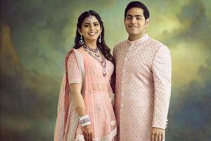 This picture of Isha and Akash Ambani in matching outfits is pure gold