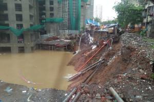 Road and adjoining plot caves in at Chandivali, no one injured