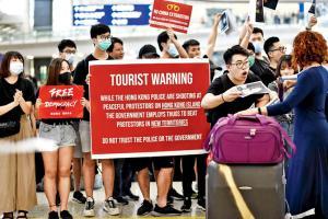 Hong Kong protesters take cause to airport