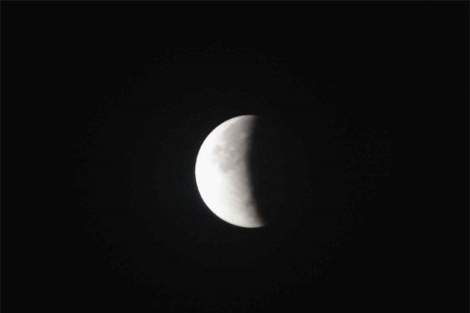 India witnesses partial lunar eclipse or ardha chandra grahan on early Wednesday