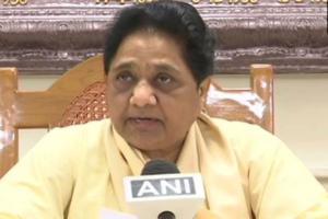 Mayawati plays caste card over raids on brother