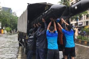 Mumbai rains: Indian Navy team joins rescue efforts in flooded Kurla