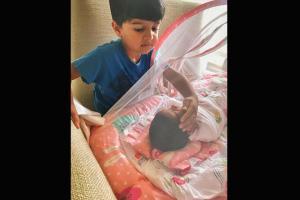 Aww! Sameera Reddy's son Hans 'fascinated' by his newborn sister