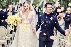 Sophie Turner and Joe Jonas look ecstatic in their wedding photo