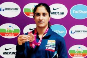 Wrestlers Vinesh, Divya win gold, Pooja settles for silver