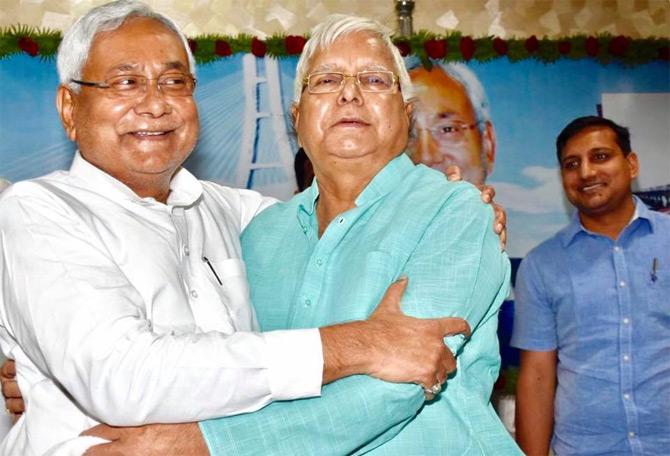 A lawyer by profession, Lalu Prasad Yadav contested the 9th Lok Sabha elections on Janata Party ticket in 1977 and won the elections. Back then, Lalu was the youngest member of the Parliament of his times as he was only 29 when he was elected to the Lower House.
In pic: Lalu Prasad Yadav shares a warm hug with Nitish Kumar.