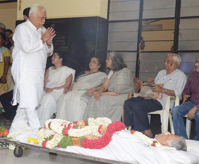 The body was taken in an ambulance to Kalapalli electric crematorium in the city's eastern suburb, with his bereaved family, relatives and friends following it in a convoy without fanfare, police security or escort.
 