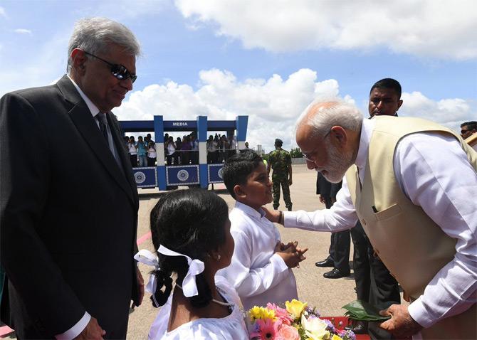In pic: PM Narendra Modi interacts with small children upon his arrival in Sri Lanka. This was PM Modi's third visit to the Island nation in the last four years.