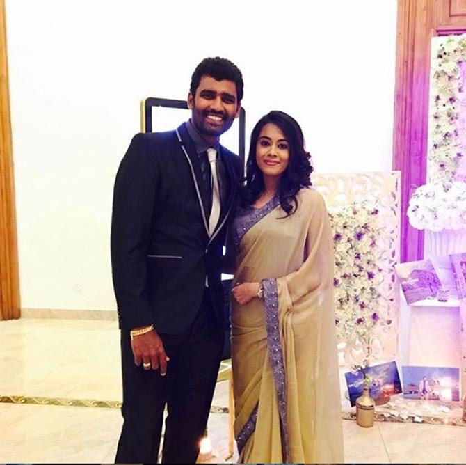 In pic: Sri Lanka cricketer Thisara Perera with his wife Sherami at a wedding reception