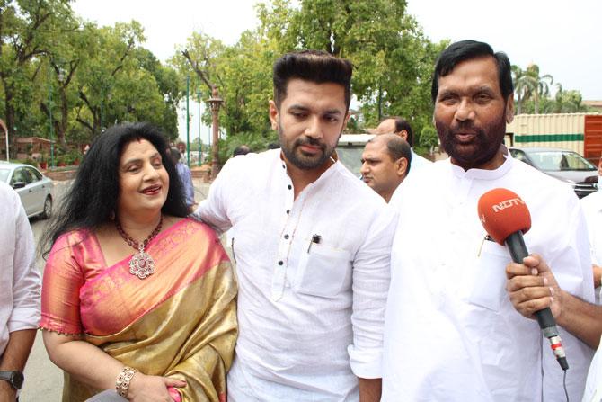 Union Minister and Lok Janshakti Party (LJP) President Ram Vilas Paswan, his son Chirag Paswan and family members arrive for the first session of the 17th Lok Sabha at Parliament House, in New Delhi on Monday