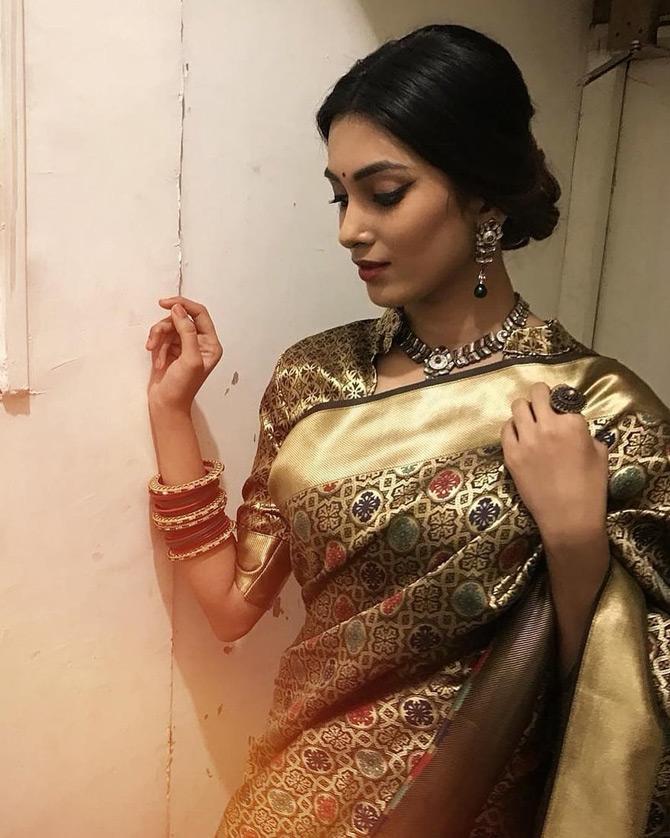 In picture: Vaishnavi Andhale looks like the picture-perfect desi girl as she shines in a gold saree with her beautiful hair tied in a bun.