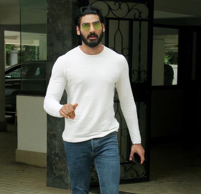Ahan Shetty and Tara Sutaria were spotted at Milan Luthria's office in Bandra, Mumbai. Suniel Shetty's son will be making his Bollywood debut with Hindi remake of Telugu film RX 100. All pictures/Yogen Shah