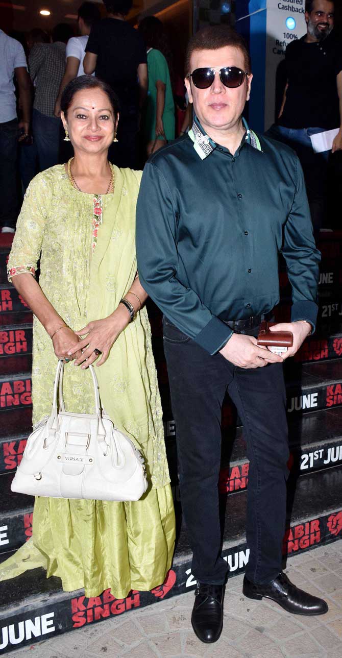 Aditya Pancholi and wife Zarina Wahab pose for the photographers as they arrive for the special screening of Kabir Singh at a popular multiplex in Andheri.