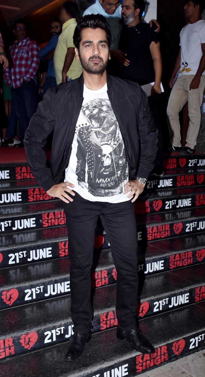 Arjan Bajwa, who plays Shahid Kapoor's brother in the film, poses for the photographers at the Kabir Singh screening in Andheri.