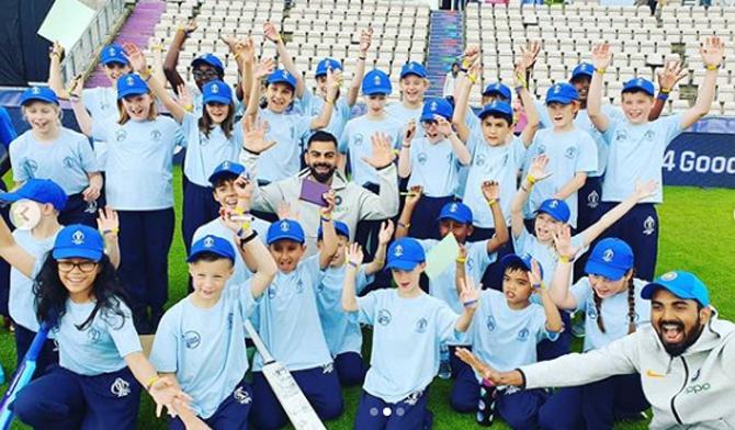 Virat Kohli and KL Rahul seen here in this group photo of themselves with a bunch of youngsters during India's training. Virat Kohli captioned the picture as, 