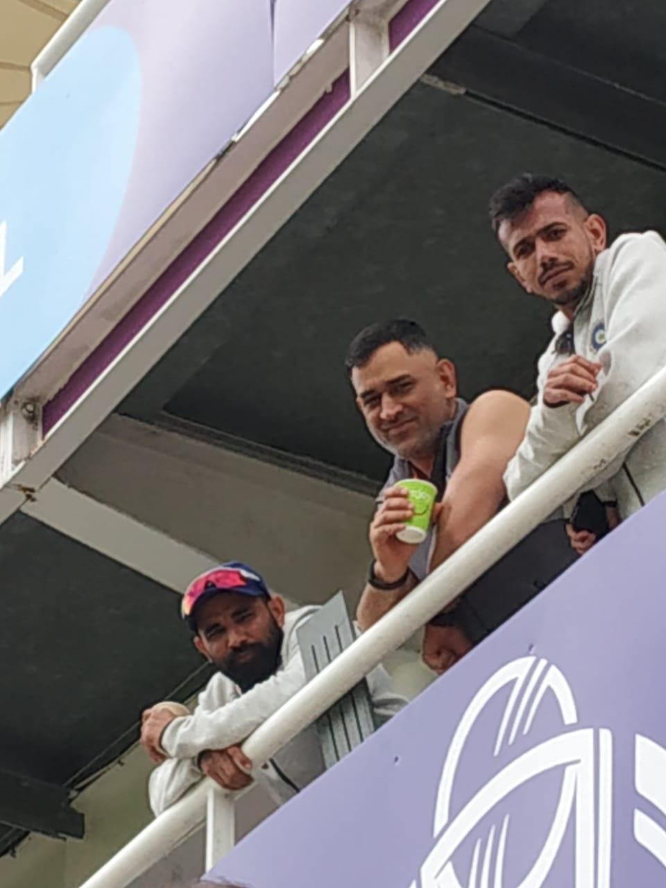 Mohammad Shami, Yuzvendra Chahal and MS Dhoni is seen here looking on as the Indian team has a fun day out on the field with kids.