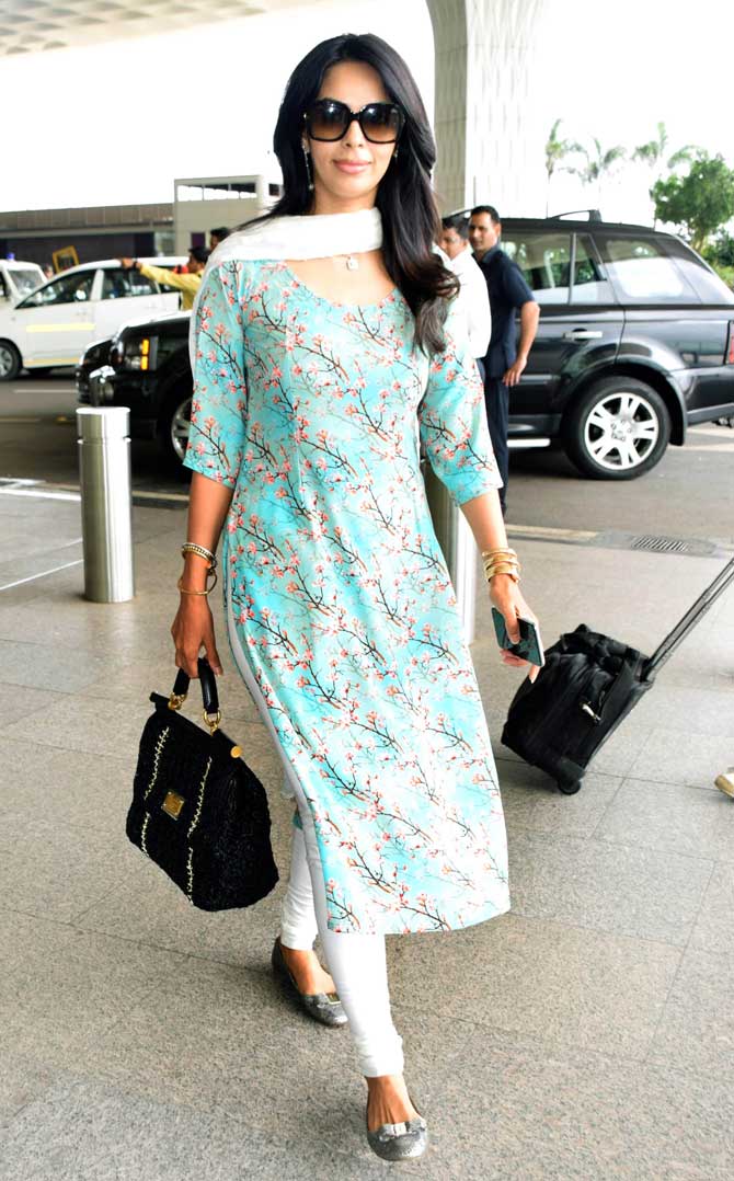 Mallika Sherawat was spotted in ethnic wear at the Mumbai airport. After her Cannes outing last month, Mallika has been tied up with a lot of photoshoots. Her Instagram account is full of vivid details about her assignments. Sherawat never ceases to amaze us with her antics. Whether on the red carpet or with her comments. All pictures/Yogen Shah