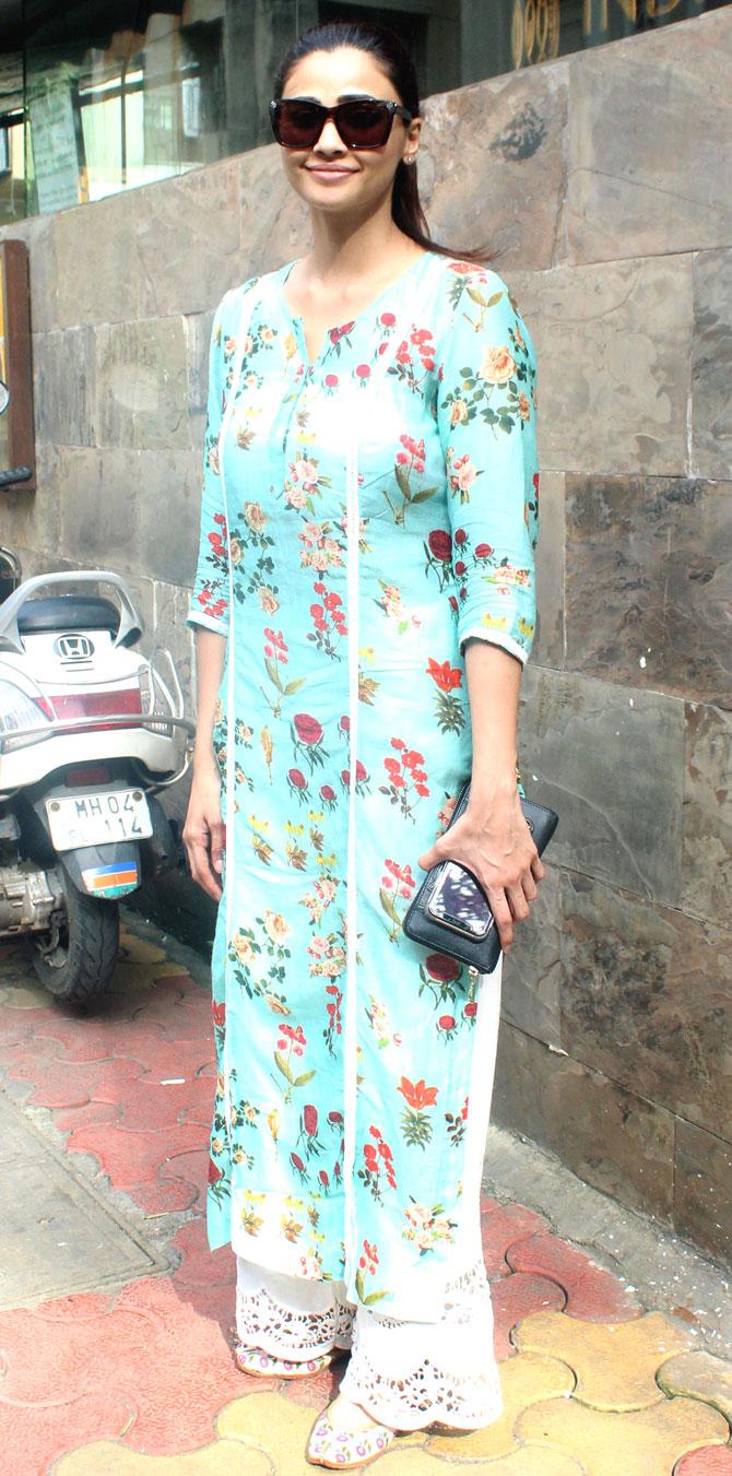 Daisy Shah was all smiles when clicked in Bandra, Mumbai. The actress, who was last seen in Salman Khan-starrer Race 3, opted for a floral blue kurta, paired with white palazzo for the outing.