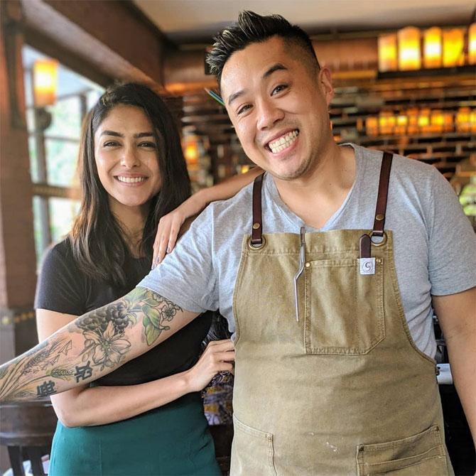 Kelvin Cheung speciality is Kel cakes. The Kelcake is a tall cake that comes in different versions like brown butter sponge, coconut mousse, roasted pineapple, passion-fruit curd, pretzels, sea salt caramel and marshmallow. 
In picture: Kelvin Cheung with Mrunal Thakur