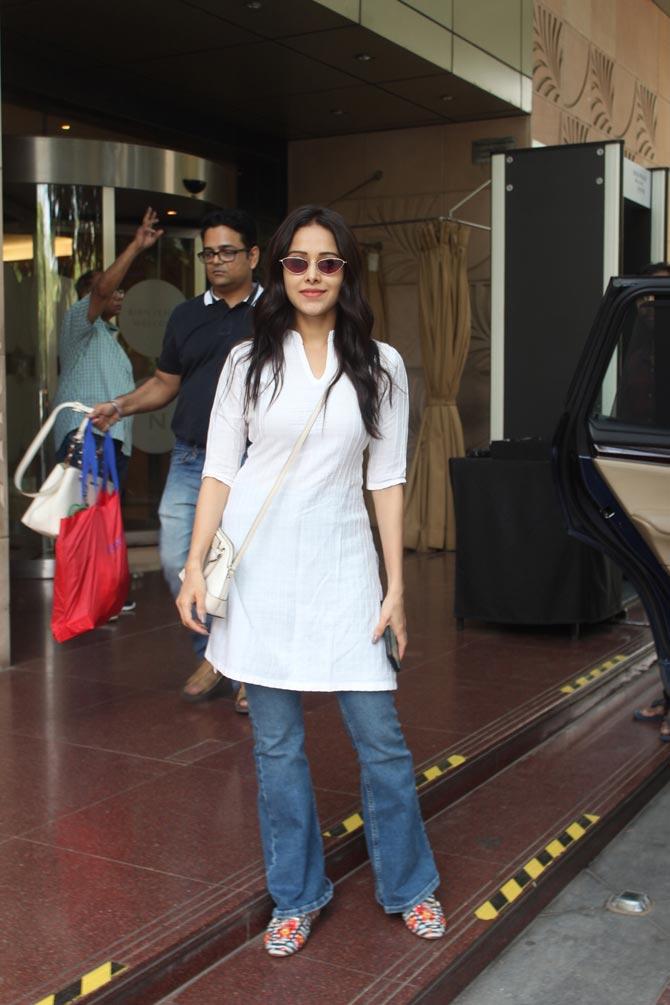 Nushrat Bharucha posed for the paparazzi when clicked in Juhu, Mumbai. The actress was seen wearing a white kurta, paired with bootcut pants for the outing. Nushrat, who was last seen on-screen in Sonu Ke Titu Ki Sweety, says she feels blessed being a part of the quirky comedy film Dream Girl, which also stars Ayushmann Khurrana. 