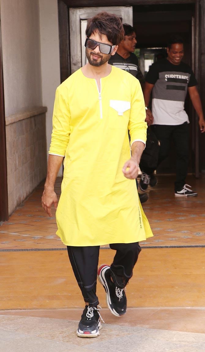 Shahid Kapoor was snapped wearing a yellow kurta paired with black jodhpuri pants at a plush hotel in Juhu, Mumbai. The actor is currently on a promotional spree for his upcoming film Kabir Singh. All set to hit the silver screen on June 21, Kabir Singh also stars Kiara Advani. All pictures/Yogen Shah