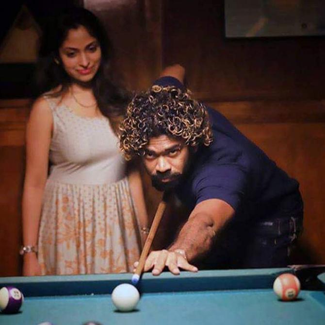 Lasith Malinga was not from a very well to do family and was born in modest conditions in a coastal village in Sri Lanka. 
In pic: Lasith Malinga with wife Tanya Perera playing snooker