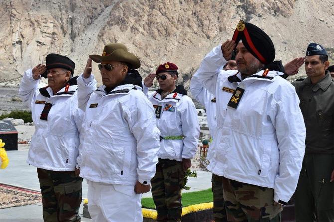 In pic: Defence Minister Rajnath Singh, Army Chief General Bipin Rawat and General Officer Commanding-in-Chief of Northern Command Ranbir Singh offer their tribute at the Army Jawan memorial in Siachen.