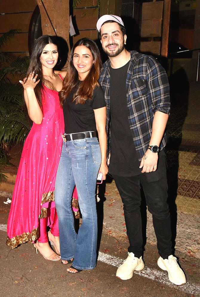 Yeh Hai Mohabbatein actor Aly Goni and other guests pose for the photographers as they arrive for Arslan Goni's Eid party at his residence in Bandra.