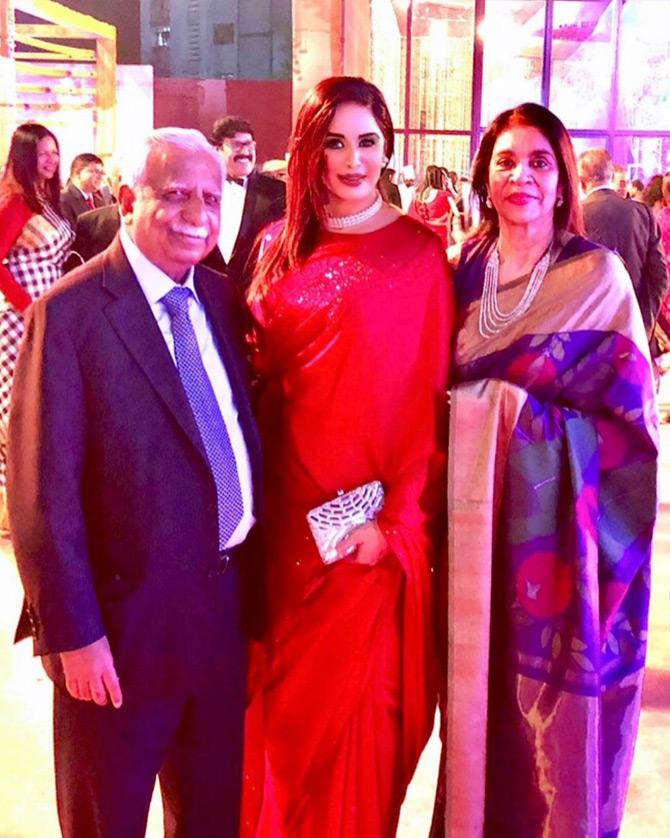 In pic: Ruby Dhalla poses for a picture with Jet Airways owners, Naresh and Neeta Goyal.