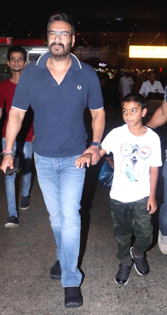 Veeru Davgan was admitted in Surya Hospital, Santacruz, Mumbai. The late director was suffering from breathing problems after which he was immediately admitted to the Surya Hospital, Santa Cruz. However, his condition got critical and resulted in cardiac arrest.
In picture: Ajay Devgn with son Yug at the Mumbai airport.