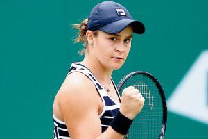 French Open champ Barty makes winning start on grass