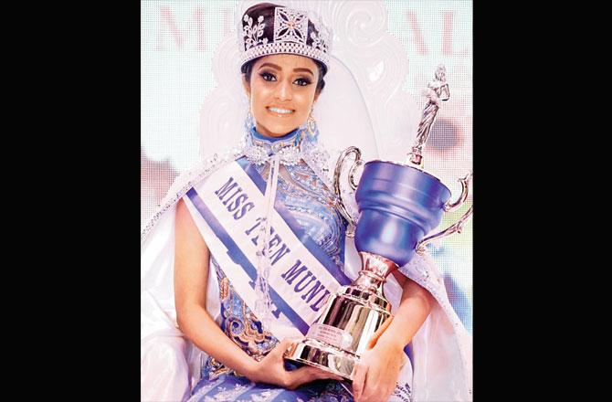 Sushmita Singh with the crown and trophy she won