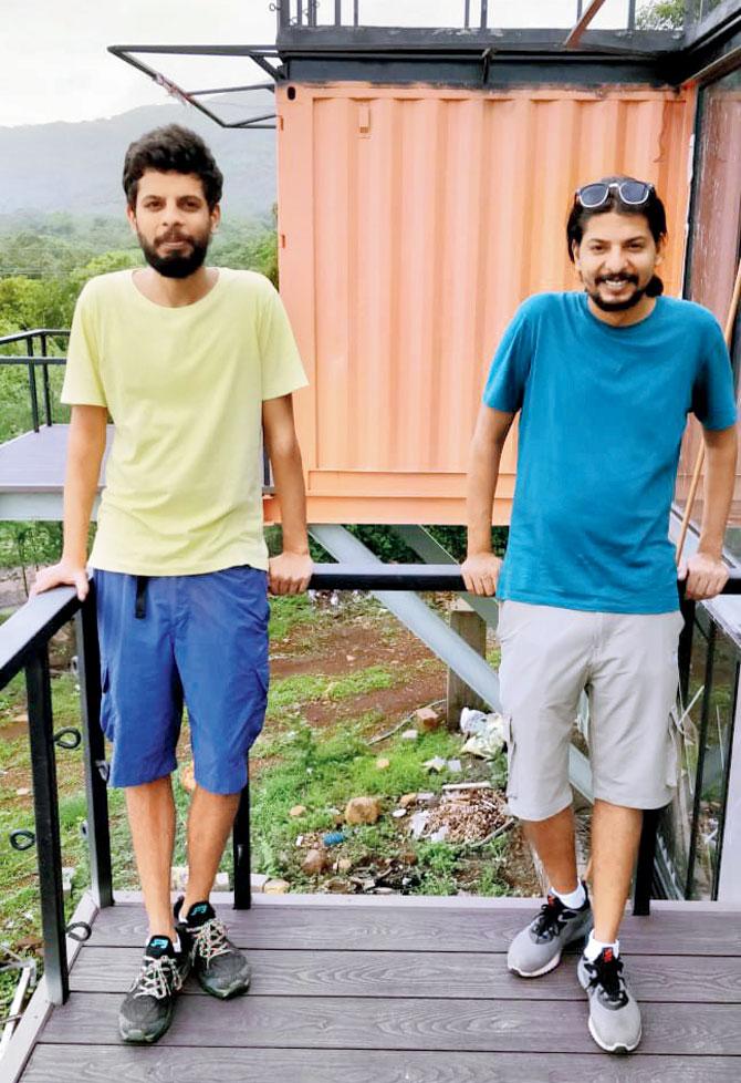 Mishal (left) with his brother Mikail in the Container Home
