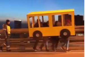 Men disguised as a bus to cross bridge will leave you in splits!