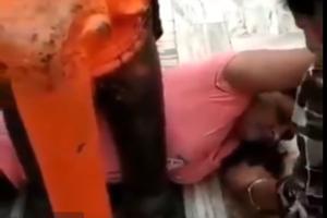 Viral video: Woman gets stuck under elephant statue, wins internet