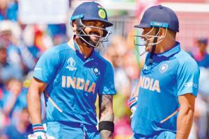 India skipper Virat Kohli and MS Dhoni during their 40-run stand v West Indies yesterday. Pic/Bipin Patel