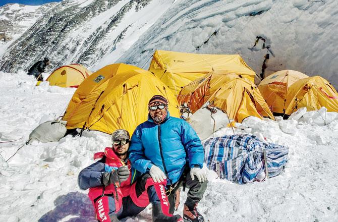 Upadhyaya with his Nepali sherpa Sunaru on their way to the peak