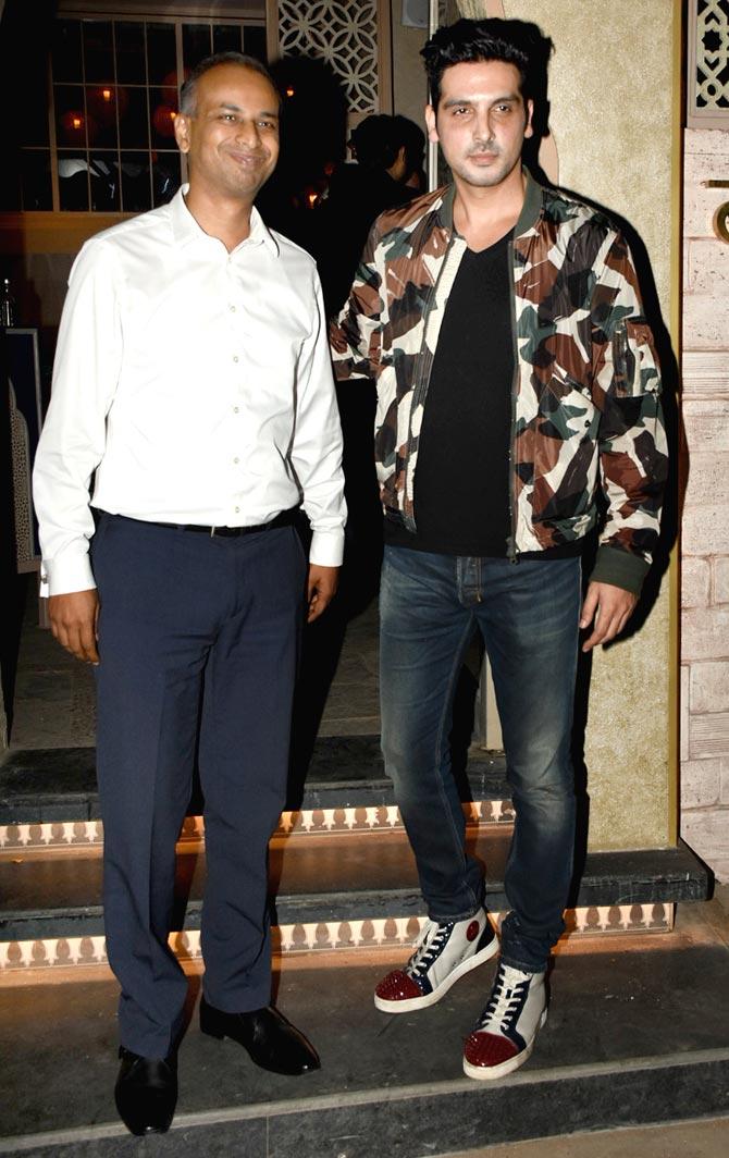 Zayed Khan also attended the restaurant launch held in South Mumbai. The actor opted for a camouflaged jacket, paired with a basic black tee and denim for the outing.