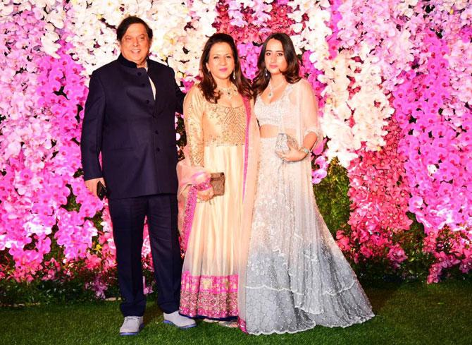 Bollywood director David Dhawan, wife Karuna Dhawan and son Varun Dhawan's girlfriend Natasha Dalal attended the glitzy celebration in honour of newly-weds Akash Ambani and Shloka MSimi Grewal ehta