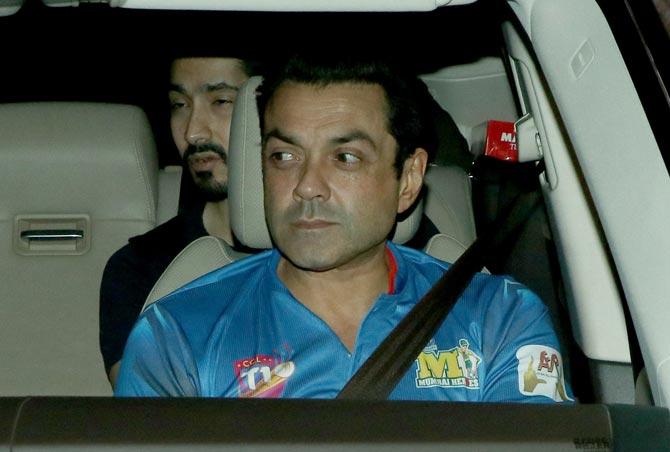 Bobby Deol dressed in his team jersey arrives for the bash at Sohail Khan's home.