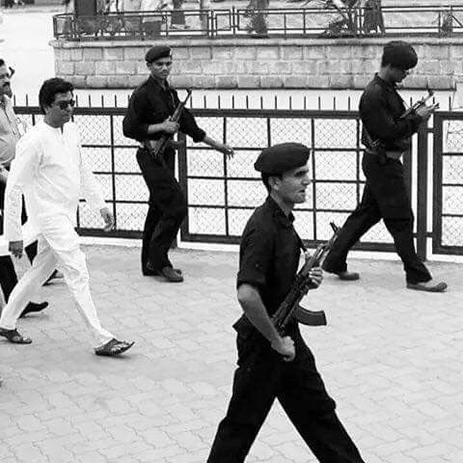 Raj Thackeray's birth name or full name was Swararaj Shrikant Thackeray which he later shortened to Raj Thackeray
In pic: Raj Thackeray escorted by security guards. Raj's son Amit Thackeray shared this picture on Instagram and captioned it: Storm's coming.