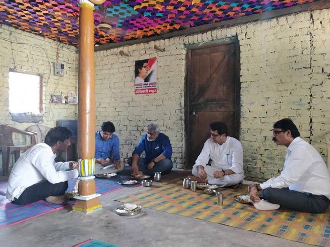 Raj Thackeray often attends events related to social causes and for the welfare of society.
In picture: MNS chief Raj Thackeray shares a meal with his party workers at part worker's residence in Kuntal village, district Palghar, Vada Tehsil.