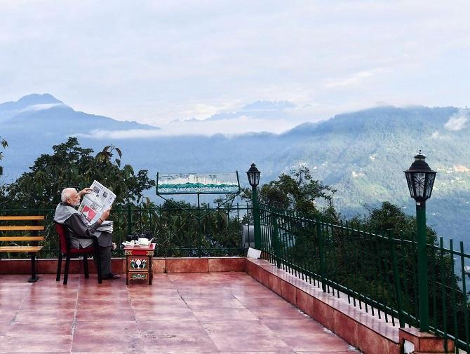 Narendra Modi visited Gangtok and instead of going around the city, he chose to enjoy the quiet morning with a newspaper. 